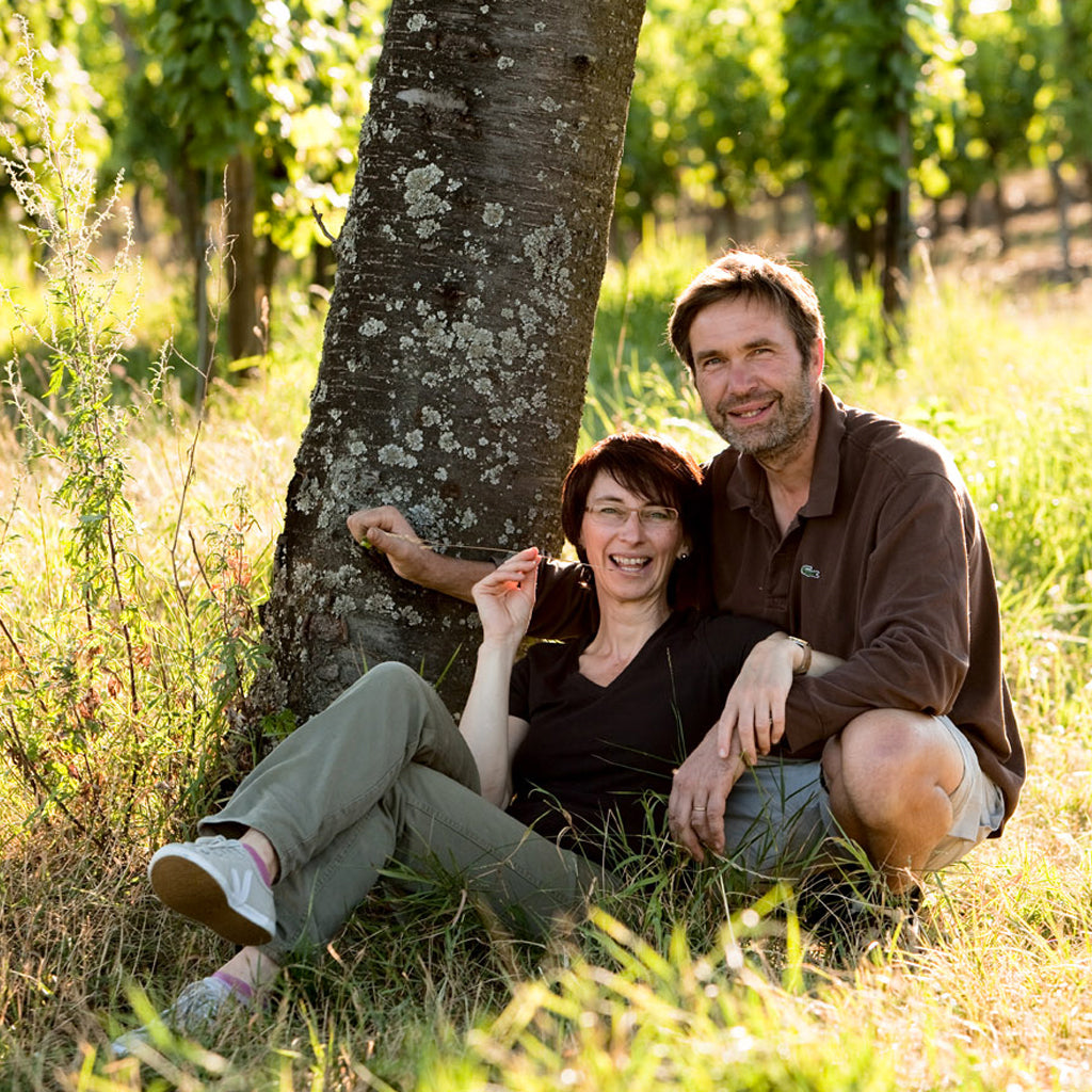Andrée & Jean Louis Trapet sat under a tree