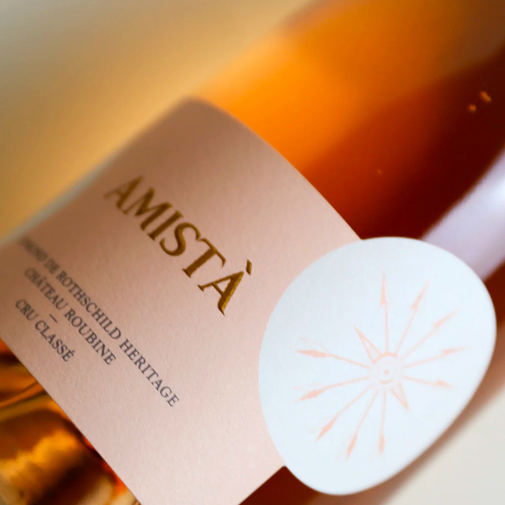 Close up bottle image showing the Amistà Wine Label