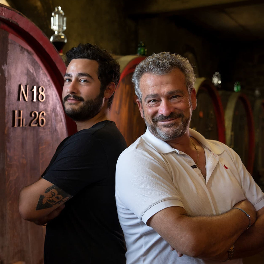 Alessandro Mori & his son Iacopo in the barrel hall of Il Marroneto