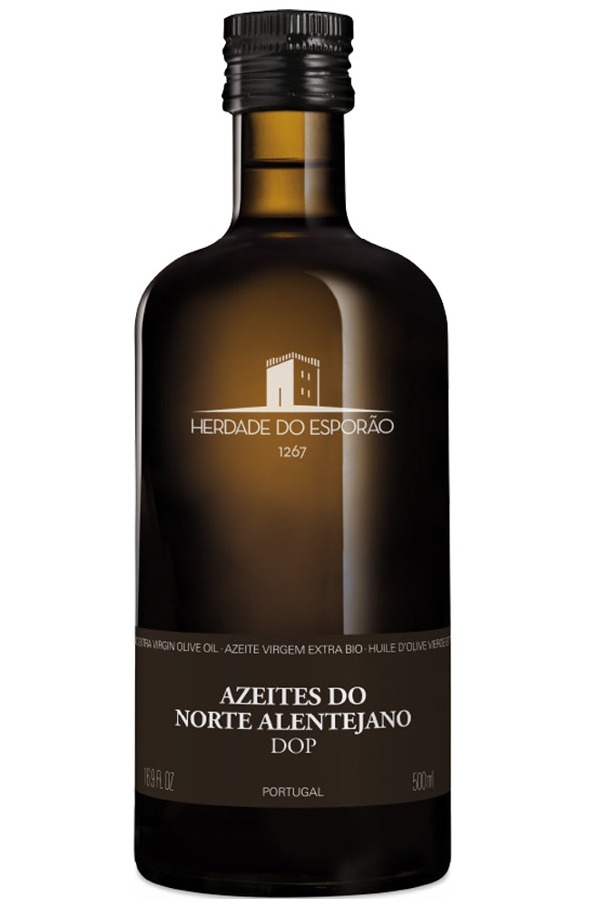 Bottle of Herdade do Esporao olive oil on a white background