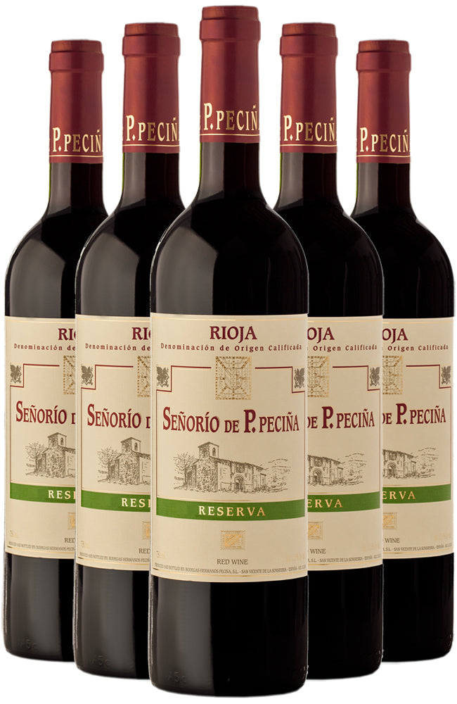 Six bottles of Senorio de P. Pecina Reserva Rioja wine on a white background